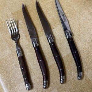 3 Sabatier Steak Knives in Laguiole style and 1 fork with wood handles.